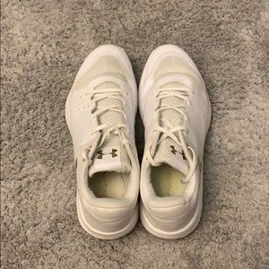White Under armor volleyball shoes.